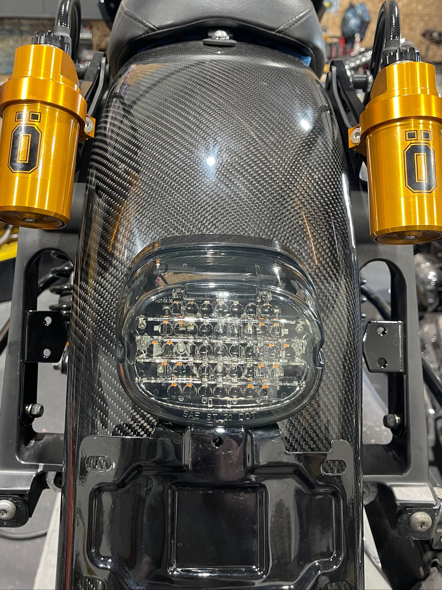 OHLINS STX relocation brackets