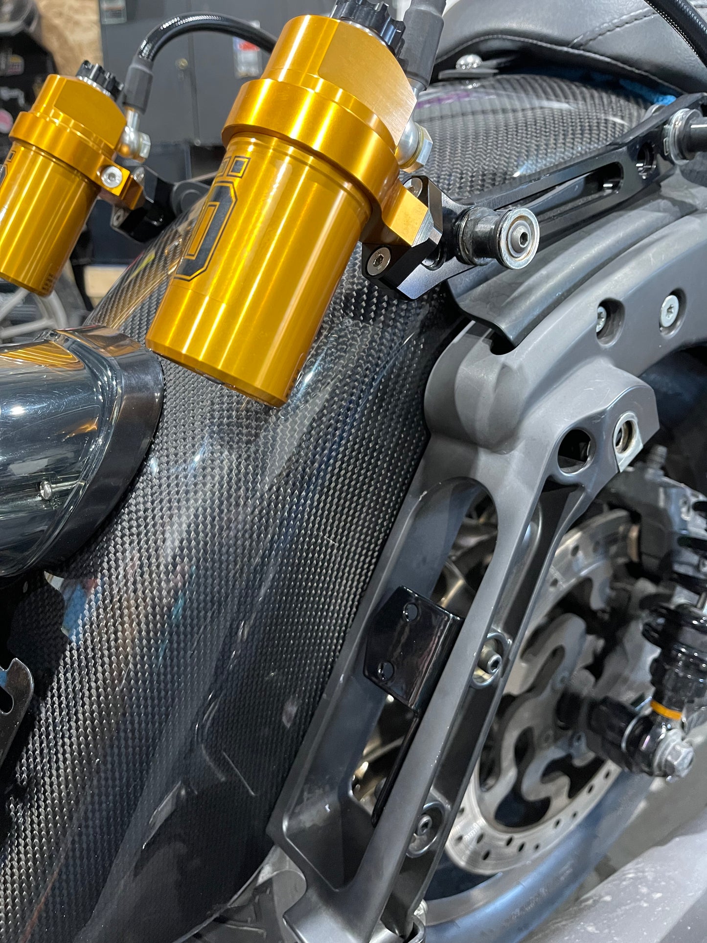 OHLINS STX relocation brackets