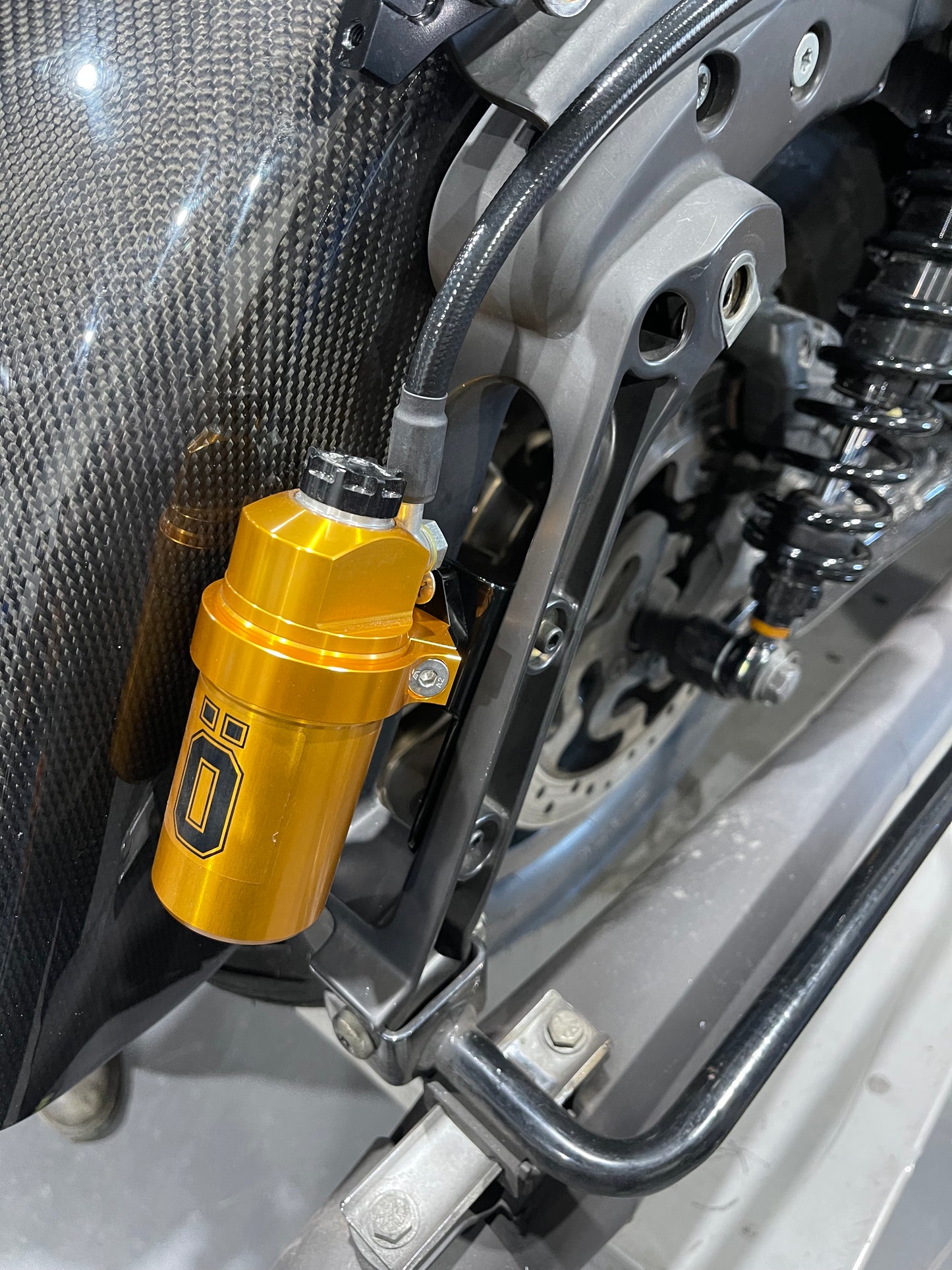 OHLINS STX relocation brackets