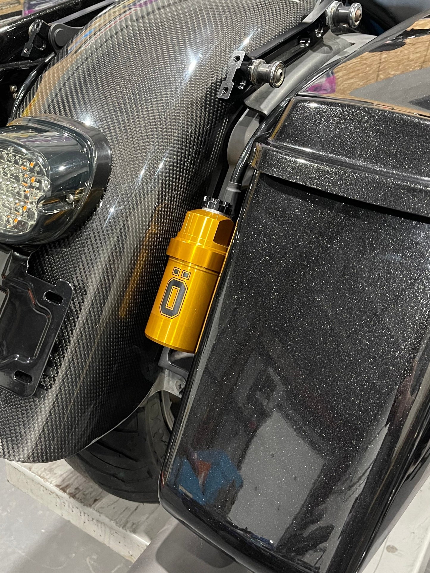OHLINS STX relocation brackets