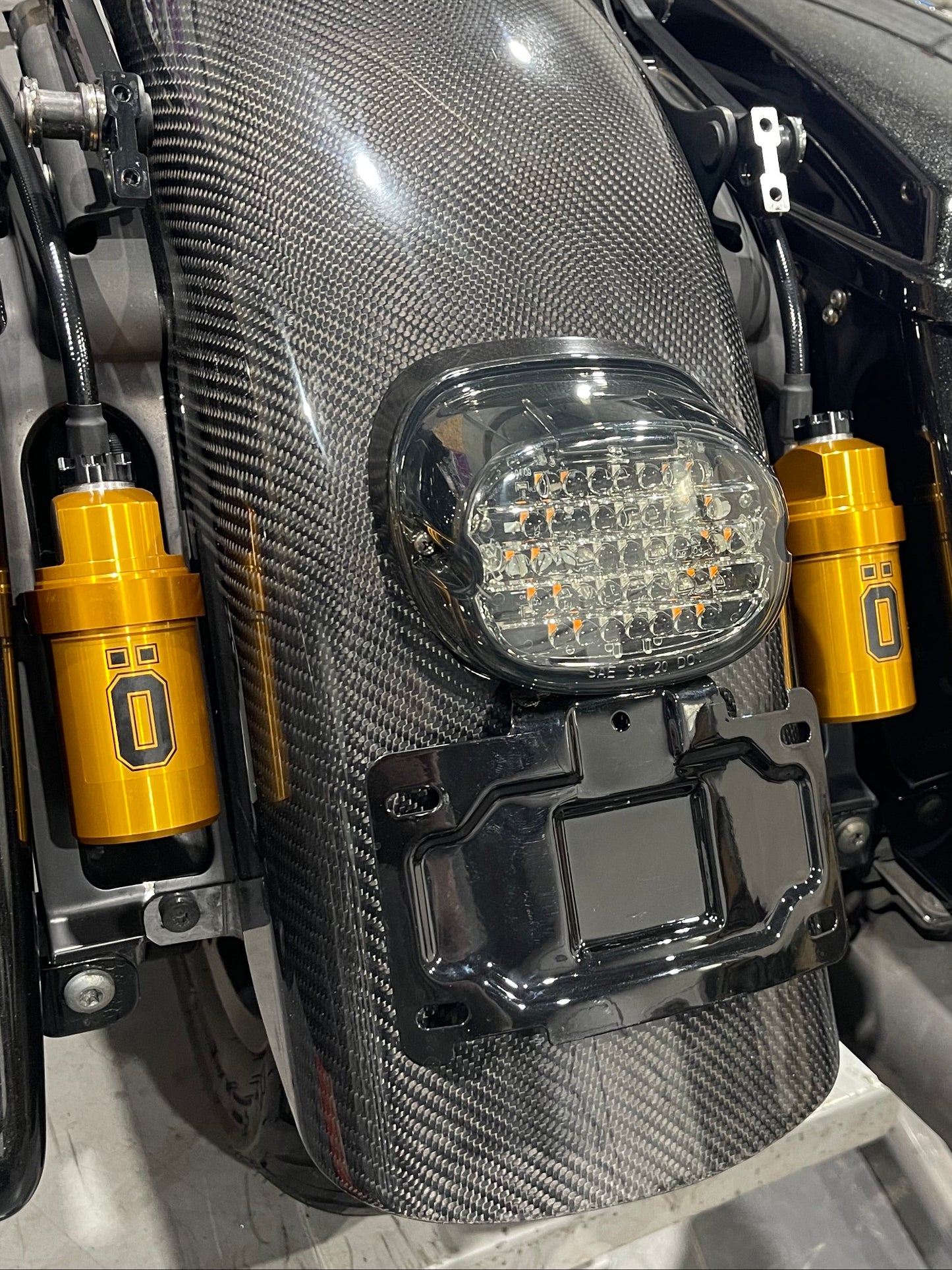 OHLINS STX relocation brackets